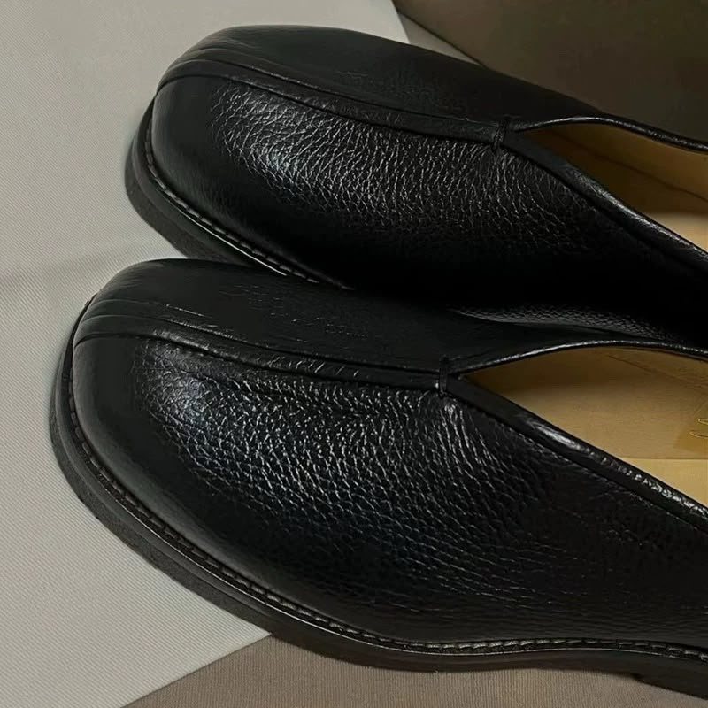 MONK slip-on in black pebbled leather, close detail